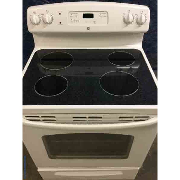 White Refrigerator w/ice-maker and White Electric Range