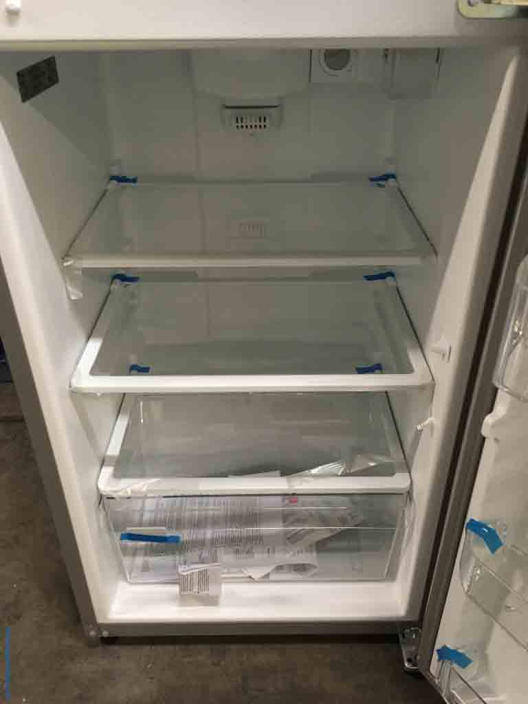 New! Scratch and Dent! 25 inch Stainless Steel Fridge with a 1 year warranty!